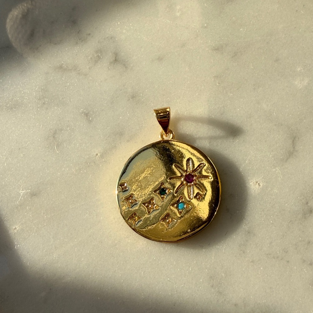Gold Pendant with Star and Gem Accents